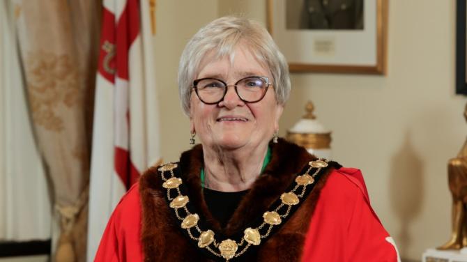 Councillors stand in silent tribute to late Mayor, Beth Adger MBE